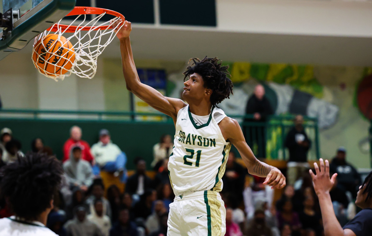 Grayson's Jacob Wilkins dunks against Newton in Tuesday night's 76-70 overtime win. (Photo: Colin Hubbard)